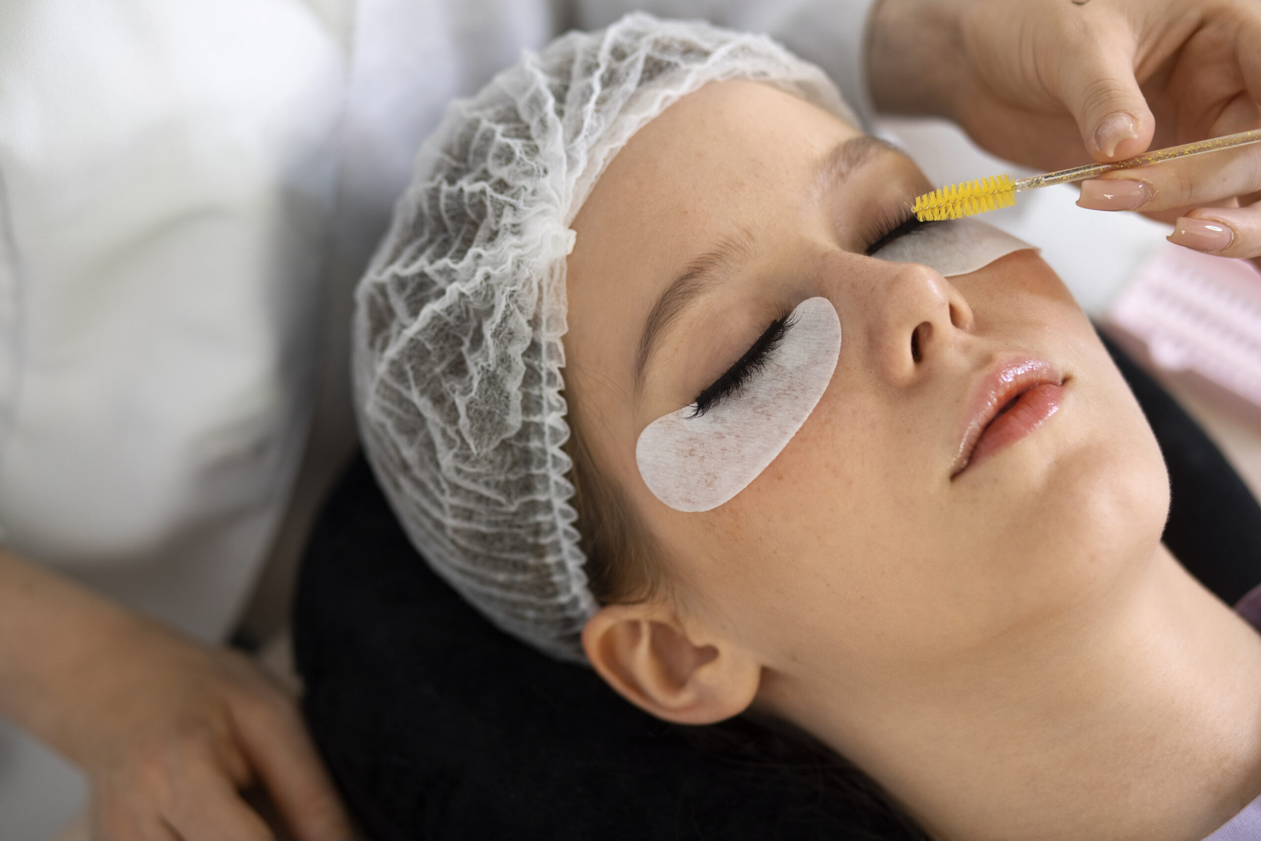 high-angle-woman-wearing-eye-patches