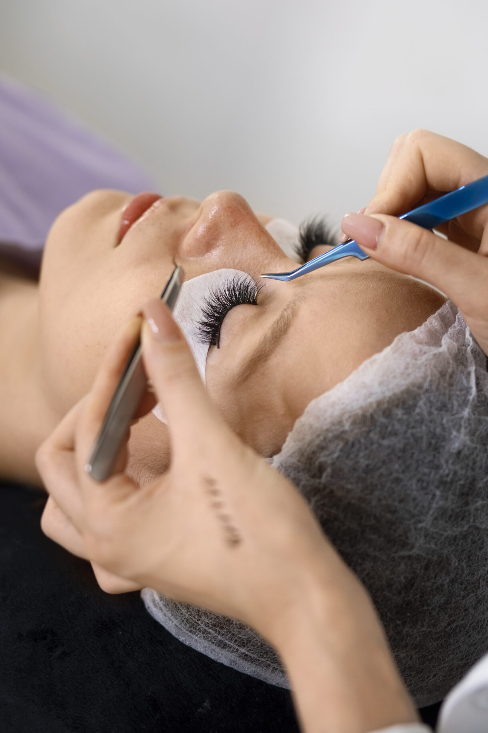 woman-wearing-eye-patches-high-angle